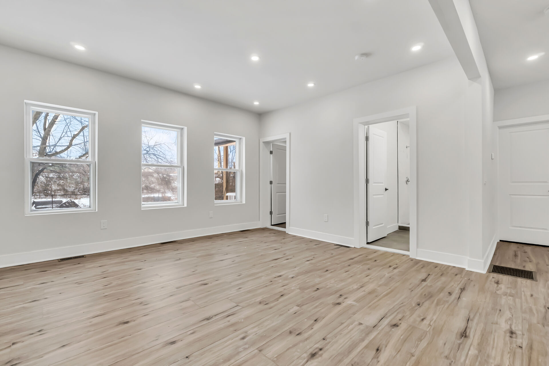 Doors to bathroom (right) and utility room (left)